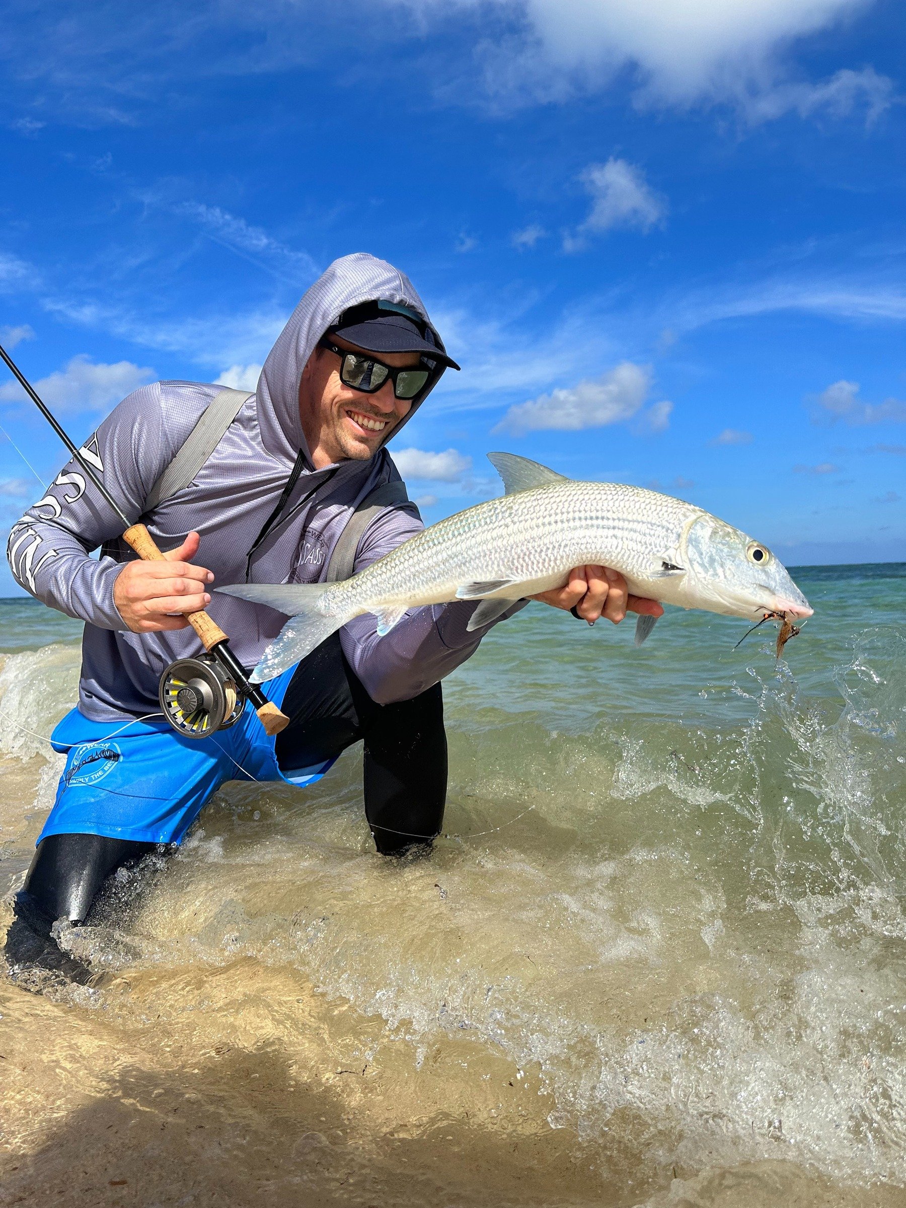 DIY fly fishing wading a low-tide flat in Grand Cayman, Cayman Islands